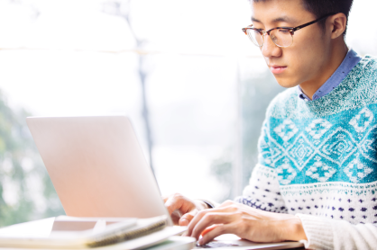 man on computer